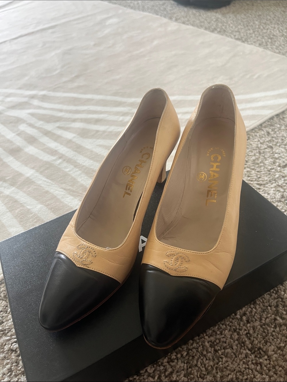 CHANEL Beige Leather Pumps with Black Cap Toe